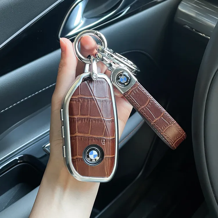 适用宝马新款5系钥匙套530li新X1X2X3X5合金壳X6X7真皮i5i7男士扣