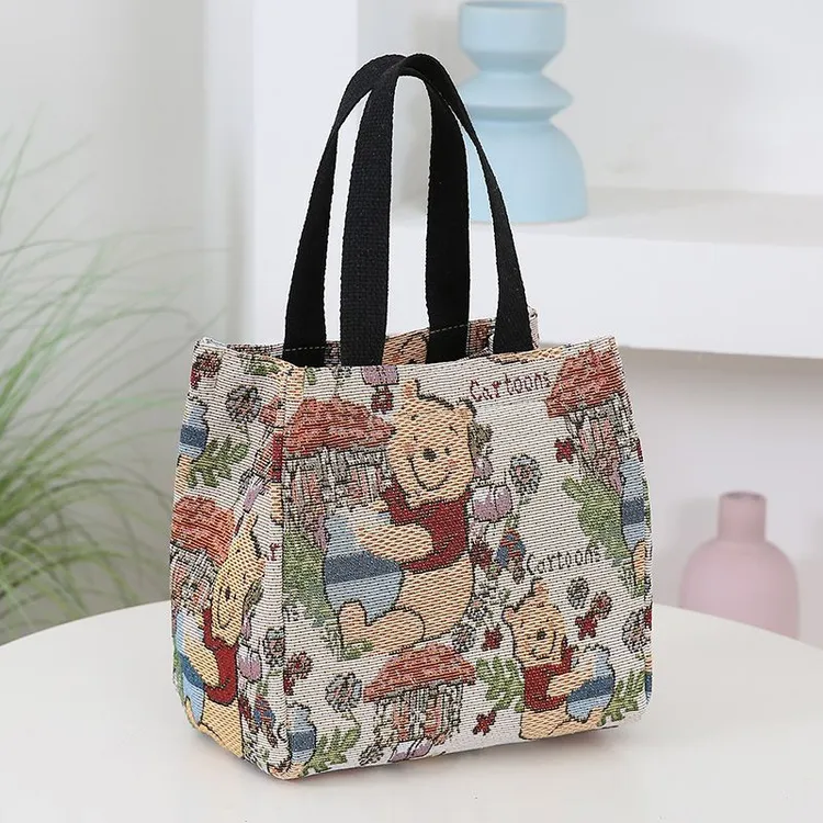 新款便携包大容量刺绣卡通饭盒包时尚帆布买菜包手提复古水桶包