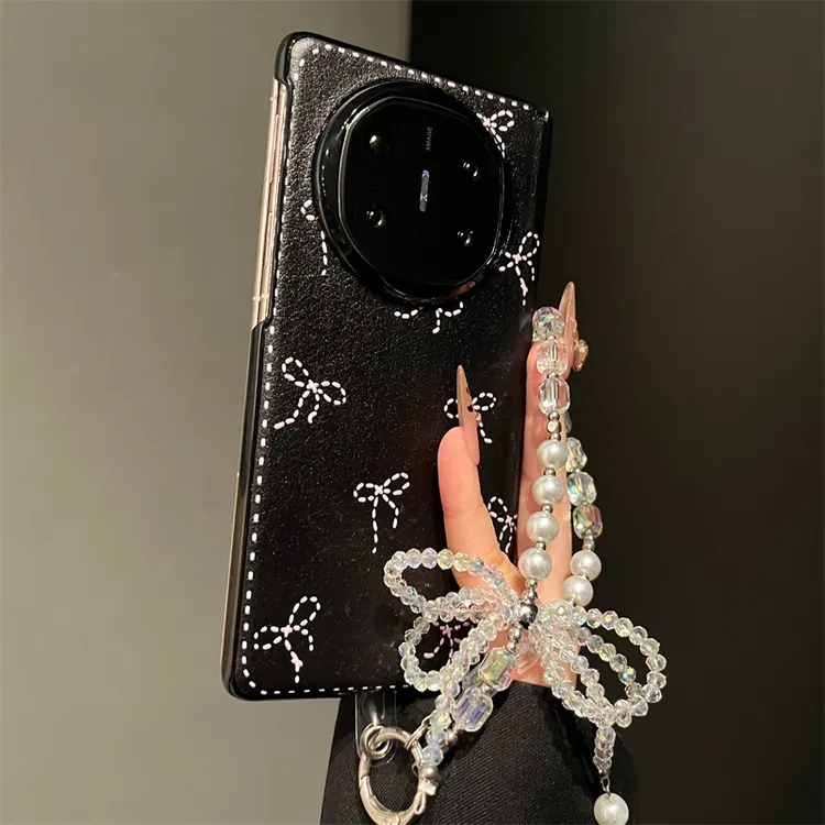 适用华为MateX6典藏版手机壳ins风虚线蝴蝶结mateX7磁吸中轴女款