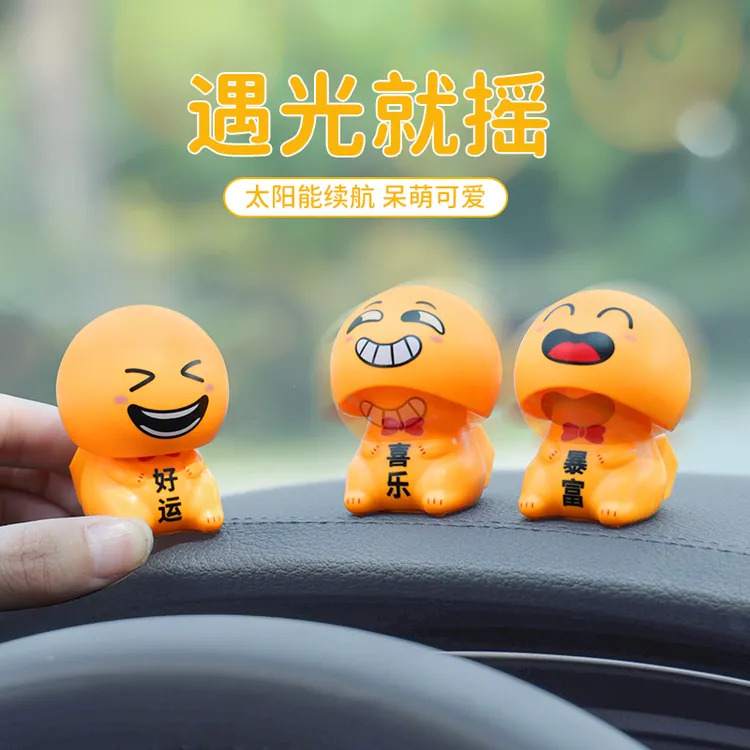 汽车太阳能点头笑脸表情摆件车载中控台搞笑公仔减压玩偶可爱装饰