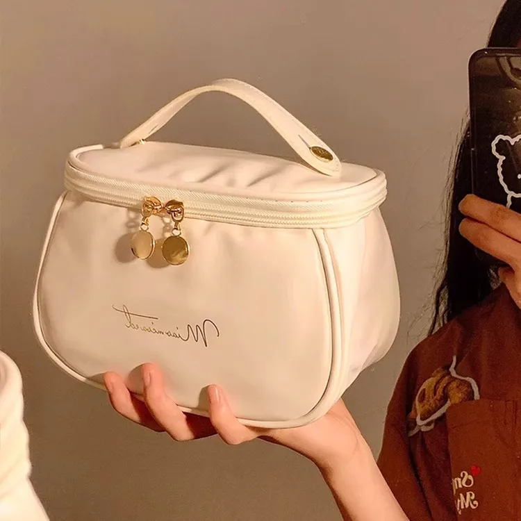 化妆包女2025新款便携手提防水化妆品刷口红收纳包分层袋随身旅行