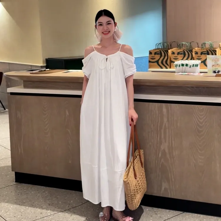 2025年新款海边度假白月光初恋白色吊带连衣裙子女夏季一字肩长裙