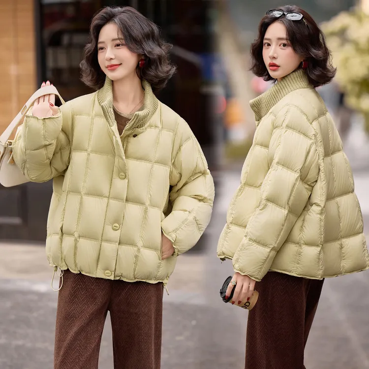 2025年冬季90白鸭绒针织立领羽绒服网红通勤加厚轻奢洋气女外套潮