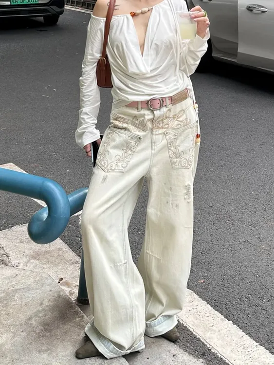 美式复古辣妹弯刀牛仔裤男女秋季新款反穿设计感高腰宽松阔腿裤子