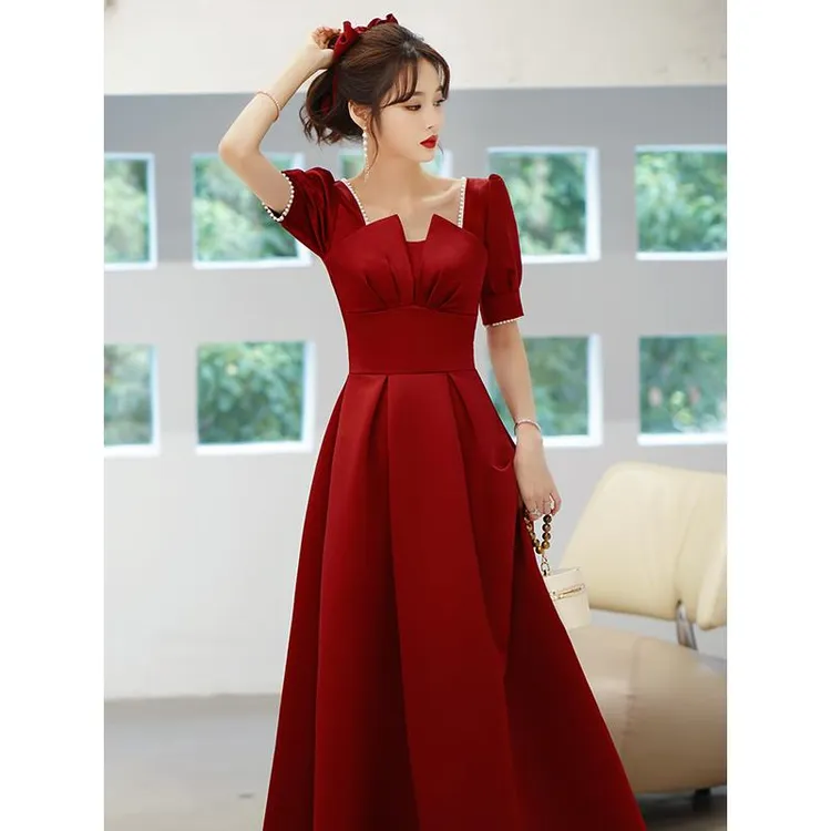 她他百伦娘2025新款酒红色缎面显瘦结婚订婚高端气质宴会晚礼服裙