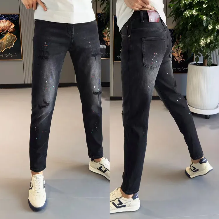 牛仔裤男款早秋男裤时尚泼墨刺绣小脚裤男弹力修身水洗黑色牛仔裤