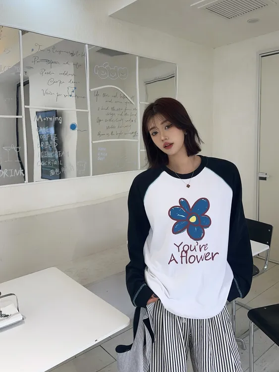 秋季印花韩版插肩袖长袖宽松纯棉圆领拼接花花撞色长袖T恤