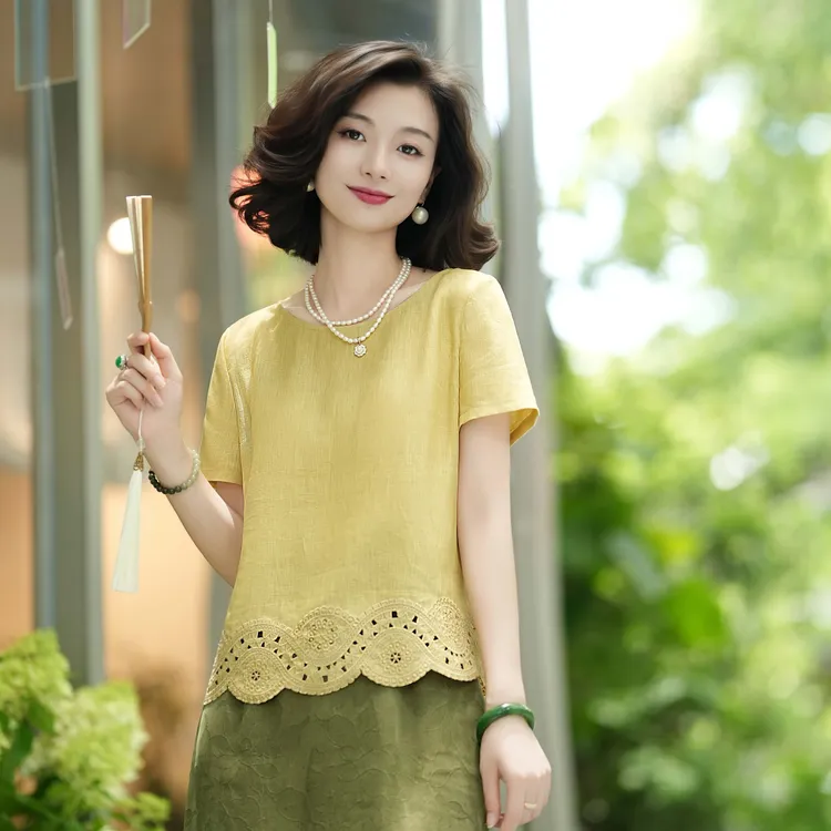 西子/【明媚午后】亚麻镂空定位绣花活力减龄鹅黄色上衣/SYTJ244