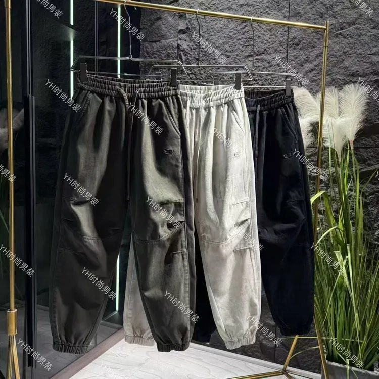 冬季新款时尚潮流立体剪裁抽绳松紧腰束脚裤宽松休闲百搭男士长裤