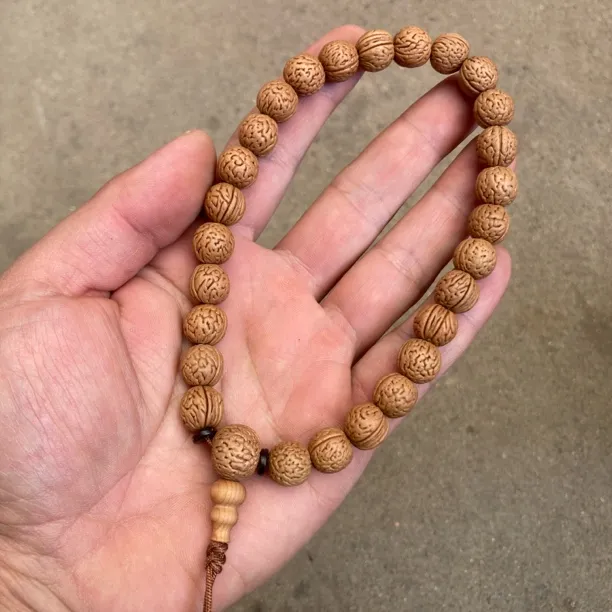 23号11毫米小桃核手持27颗小金豆颗颗沉水一物一图