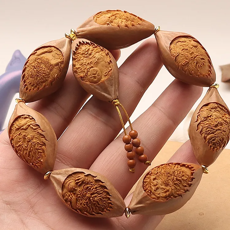 天然橄榄核雕刻龙之九子招财貔貅手串大核精工老油核文玩20x38