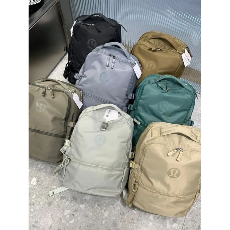 户外简约轻便韩版百搭多功能超轻潮流纯色女士男士防水双肩背包