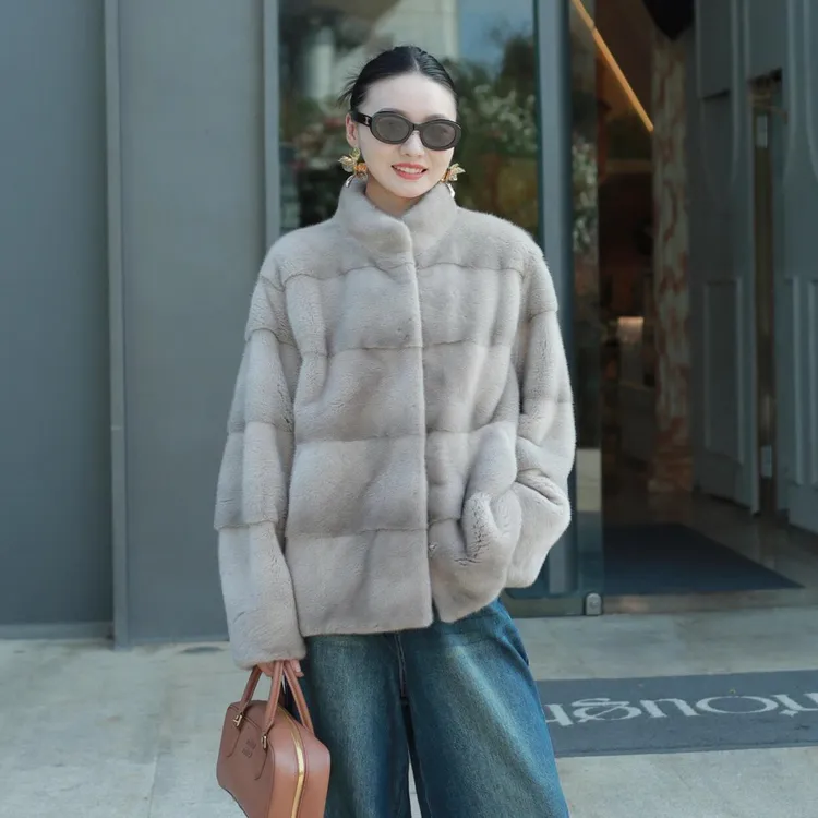 "曼城故事"新款立领横排塔式微弧袖脊子靠坎水貂外套女整貂大衣女