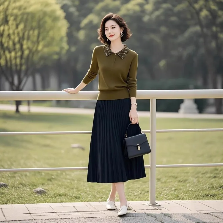今年流行的针织套装女装2025秋季新款polo领上衣百褶半身裙两件套