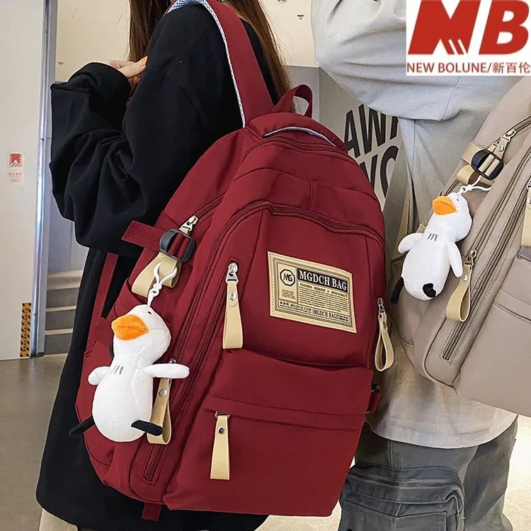 新百伦【奥莱撤柜】书包女初中生小学生4-6年级减负双肩包男高中