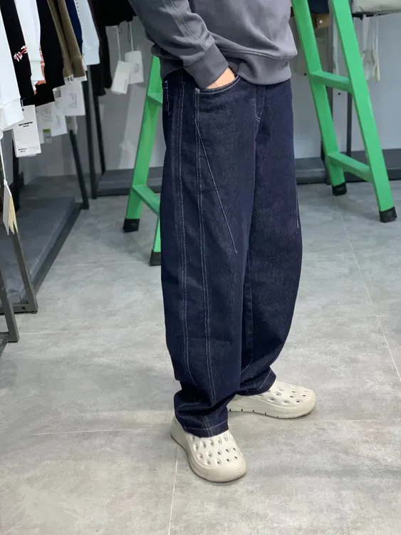 秋冬新款普洗牛仔裤蓝色弯刀直筒裤子牛长裤男裤