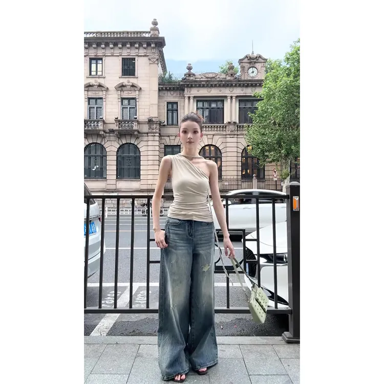 辣妹斜肩洋气时尚小众气质设计款上衣百搭显瘦休闲牛仔长裤套装女