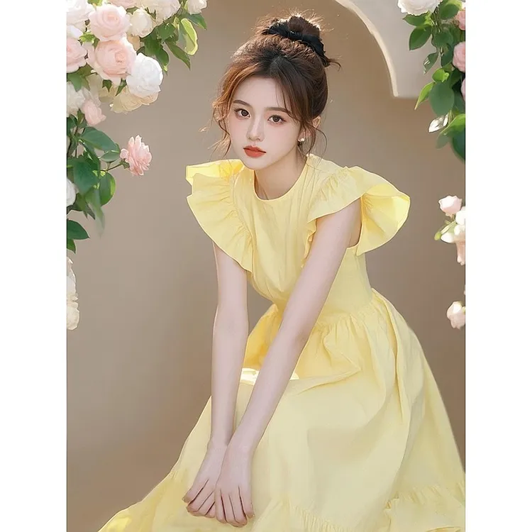 海边度假黄色小飞袖连衣裙2025独特超好看春装多巴胺气质绝美裙子