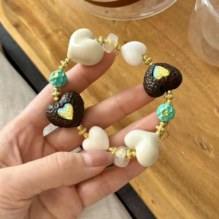 铜合金木质手链 象牙果爱心手链搭配坨骨爱心,香香木爱心,配跑环