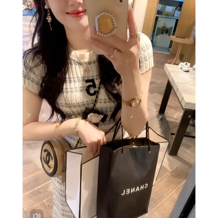 小香风山茶花冰丝条纹针织连衣裙女夏收腰显瘦小个子辣妹包臀短裙