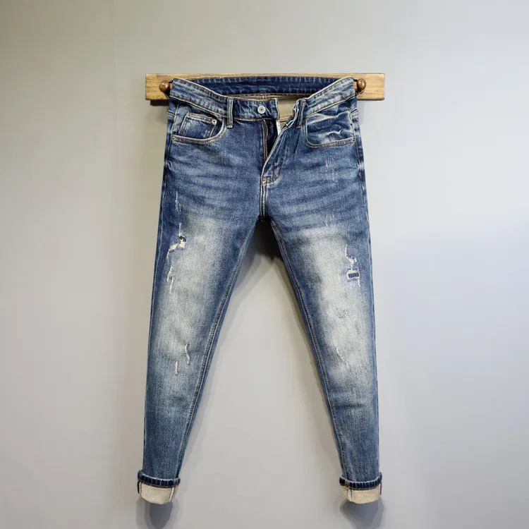 潮牌秋季新款蓝色水洗简单破洞刮烂修身九分牛仔裤男士青年小脚裤