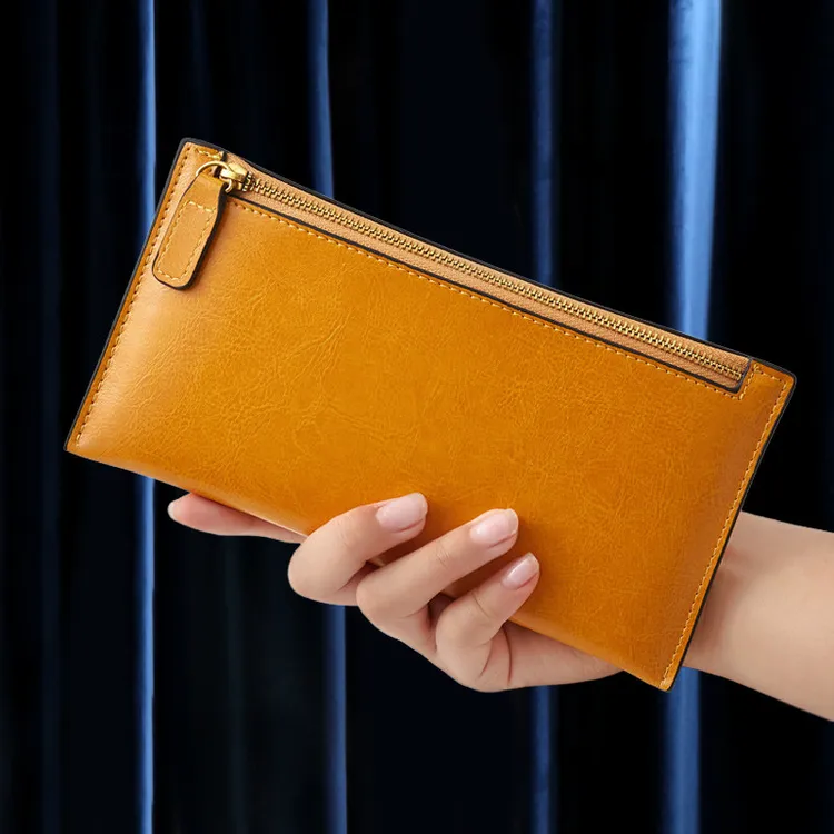 纯牛皮超薄长款拉链钱包简约百搭真皮防消磁多卡位大钞皮夹放手机