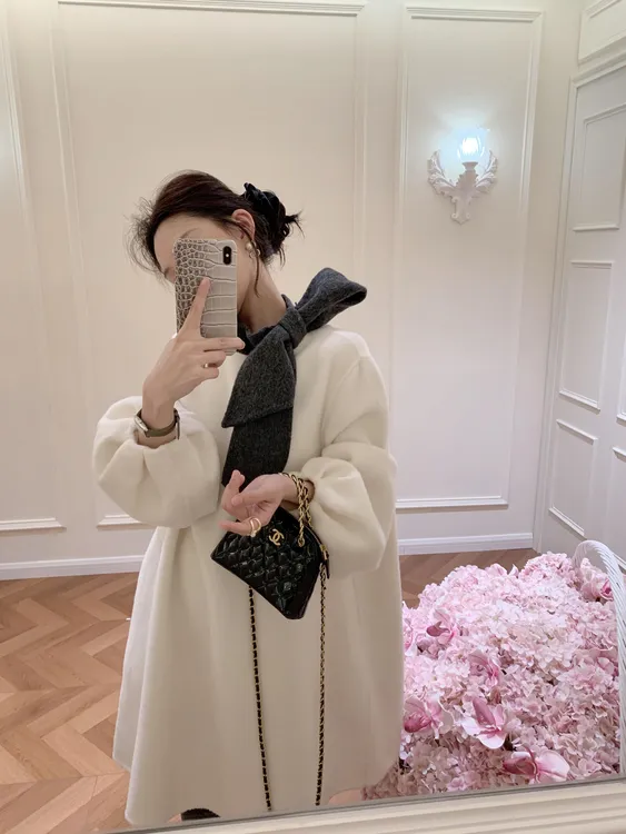 韩系黑白撞色蝴蝶结毛呢连衣裙秋冬季富家千金赫本风设计感中长款