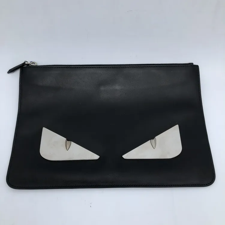 95新 FENDI/芬迪 小怪兽黑色手拿包/008