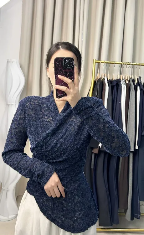 欧美风气质镂空长袖蕾丝女款秋季新款2025不规则交叉收腰显瘦上衣