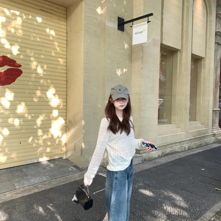 2025夏季新款韩系慵懒风镂空长袖针织衫七分牛仔裤减龄百搭两件套