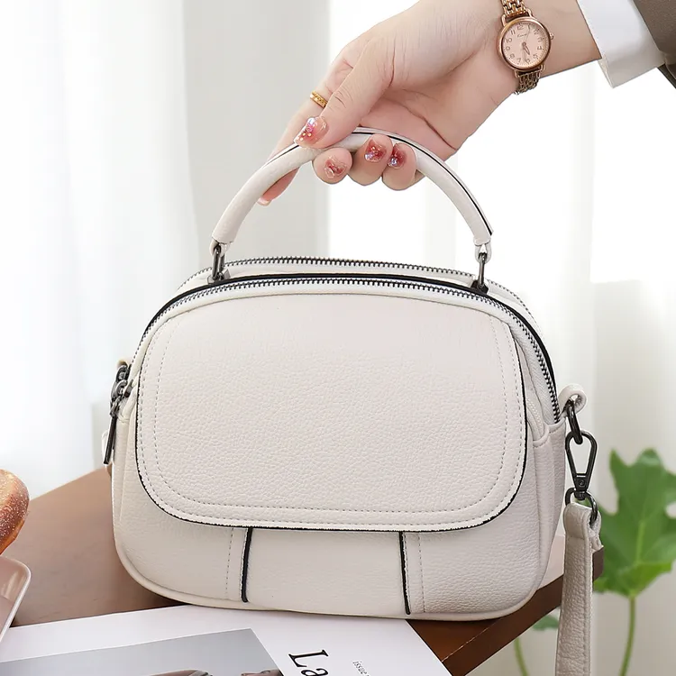 包包女2025新款时尚百搭手提包高级感软皮小圆包通勤单肩斜挎包包