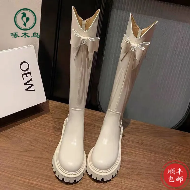 啄木鸟黑色白色长靴女百搭甜酷靴蝴蝶结秋冬季新款韩版粗跟高筒骑