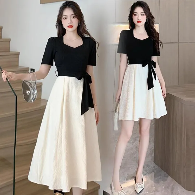 法式小香风黑色拼接连衣裙女2025新款别致设计感赫本风小个子