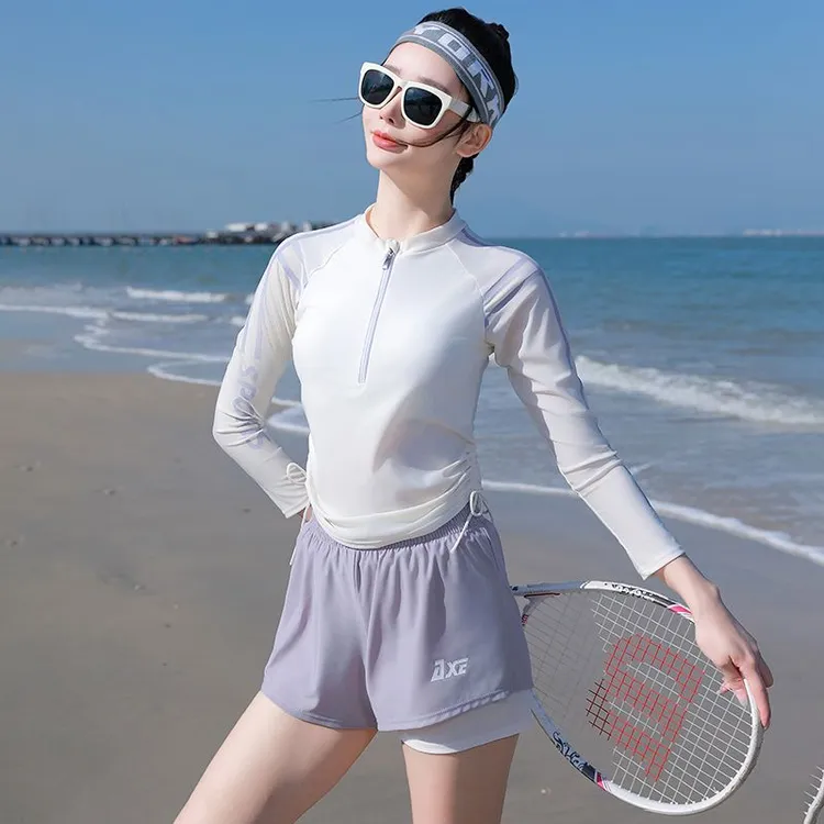 保守长袖防晒泳衣女2025年新款显瘦遮肚分体式平角学生温泉游泳装