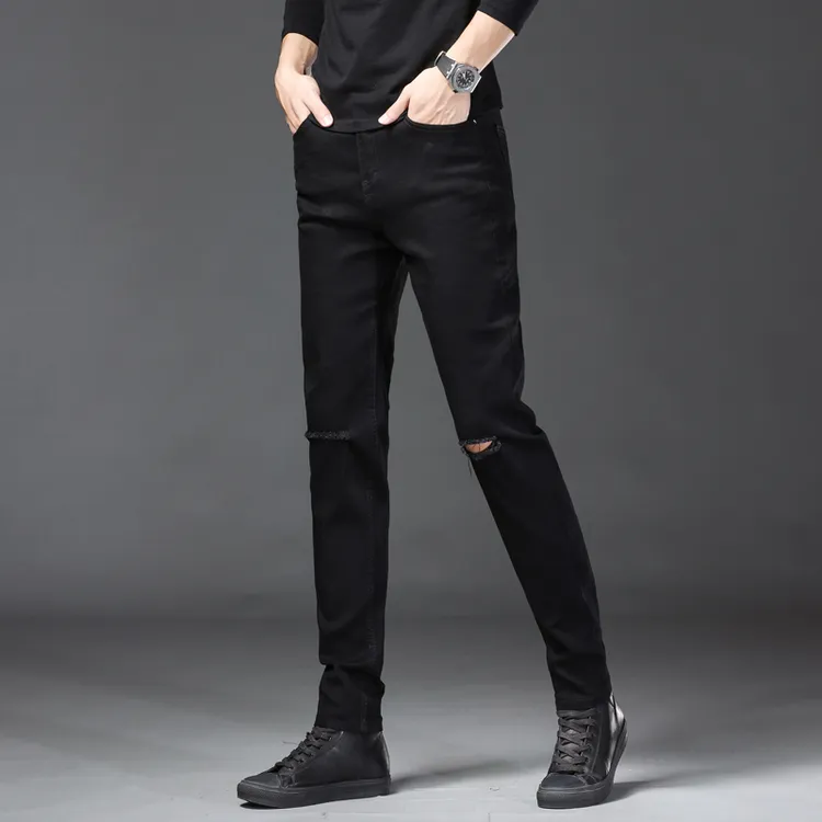 春秋款纯黑色一字破洞修身小脚牛仔裤男青年显瘦个性显腿长四季款