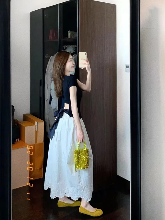 2025夏季新款韩系黑色设计感后背镂空上衣镂空刺绣气质白色半身裙