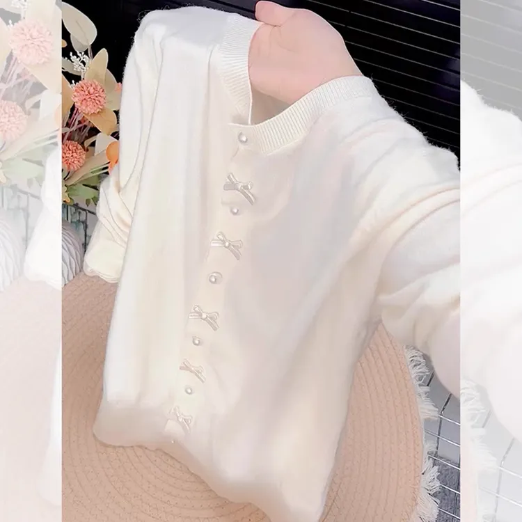韩系温柔风气质百搭上衣女2025秋季简约高级感蝴蝶结纽扣针织开衫