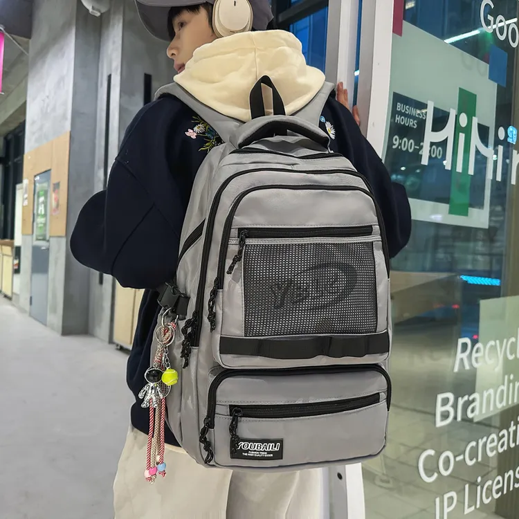 减负护脊日系工装潮牌大容量双肩包男电脑背包初中高中学生书包女