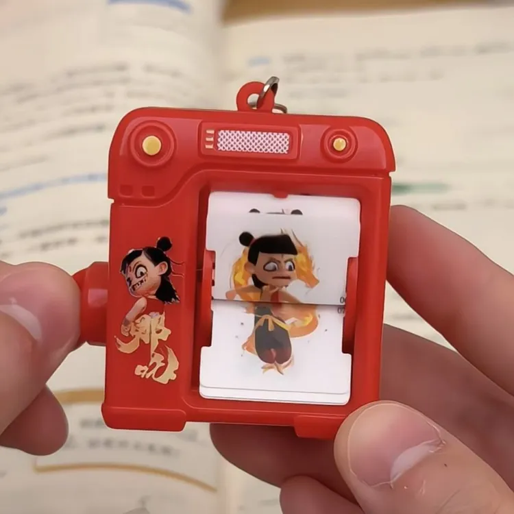 哪咤手翻书钥匙扣创意哪吒动画翻页机小玩具哪吒电影周边包包挂件