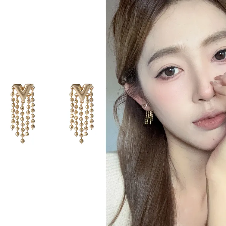 oushipei/欧诗佩 铜合金耳饰 气质轻奢金色串珠流苏耳钉