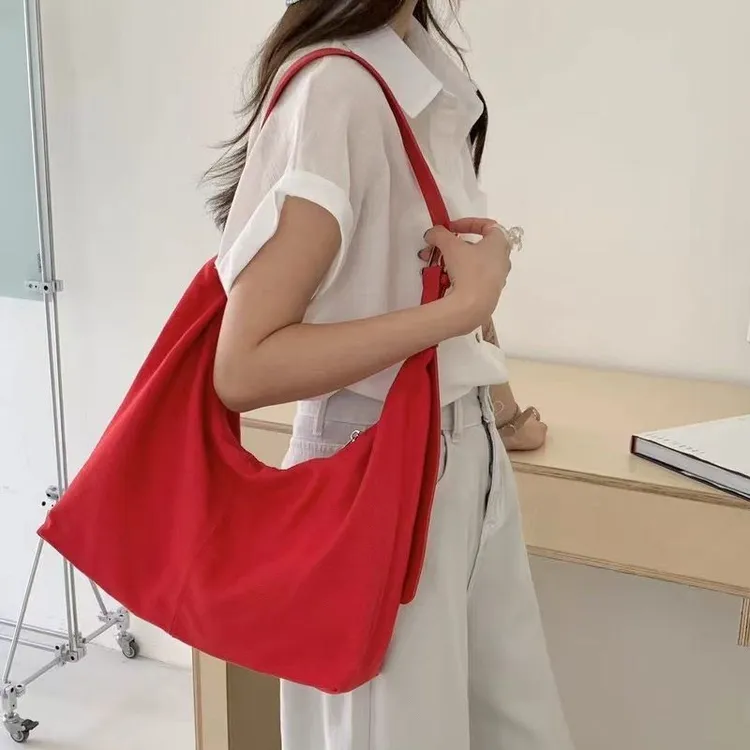 竹笋喵喵 简约风红色拉链斜跨饺子包女2025新款韩系ins百搭单肩包