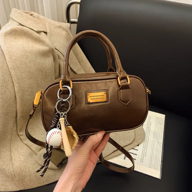 2025爆款秋冬新款简约百搭保龄球包包手提单肩斜跨小方包洋气女包