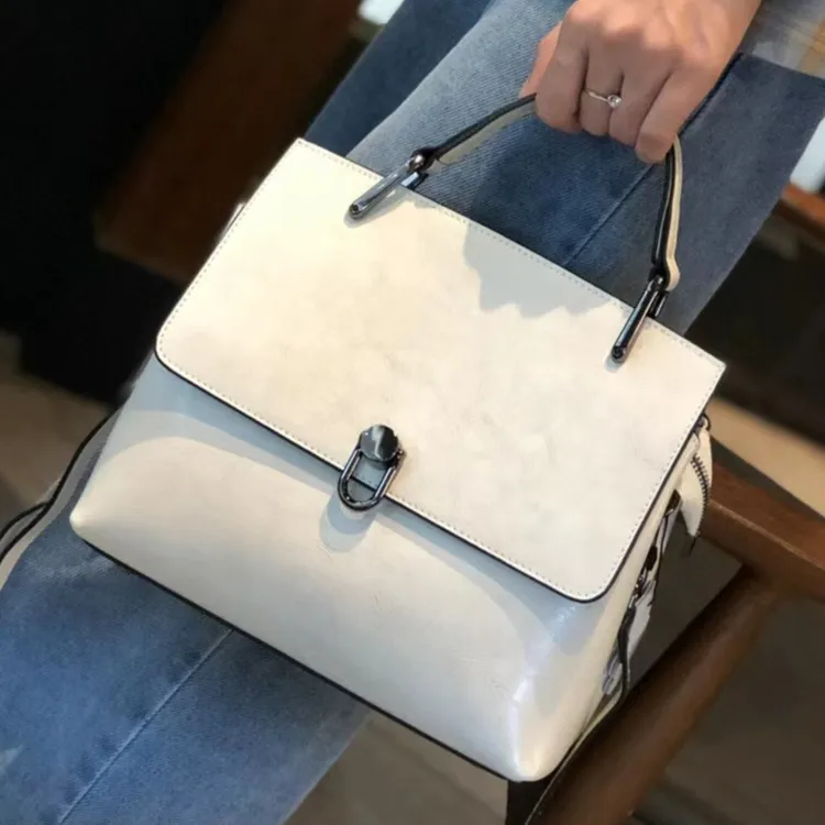 真皮女包牛皮2025新款手提单肩斜挎包大容量锁扣包欧美包包百搭