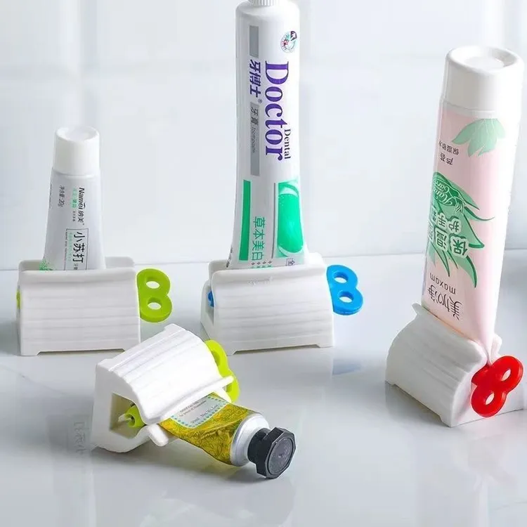 家用牙膏按压器挤颜料挤小样手动夹子懒人挤牙膏神器洗面奶挤压器