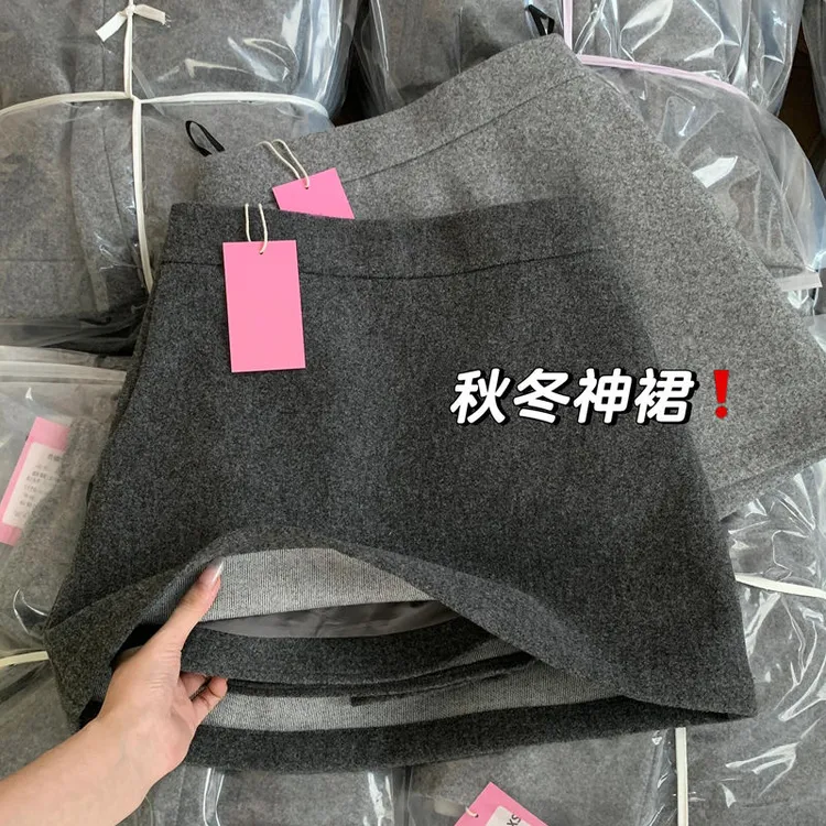 高级感灰色毛呢半身裙女2025秋冬韩系高腰显瘦防走光a字包臀短裙