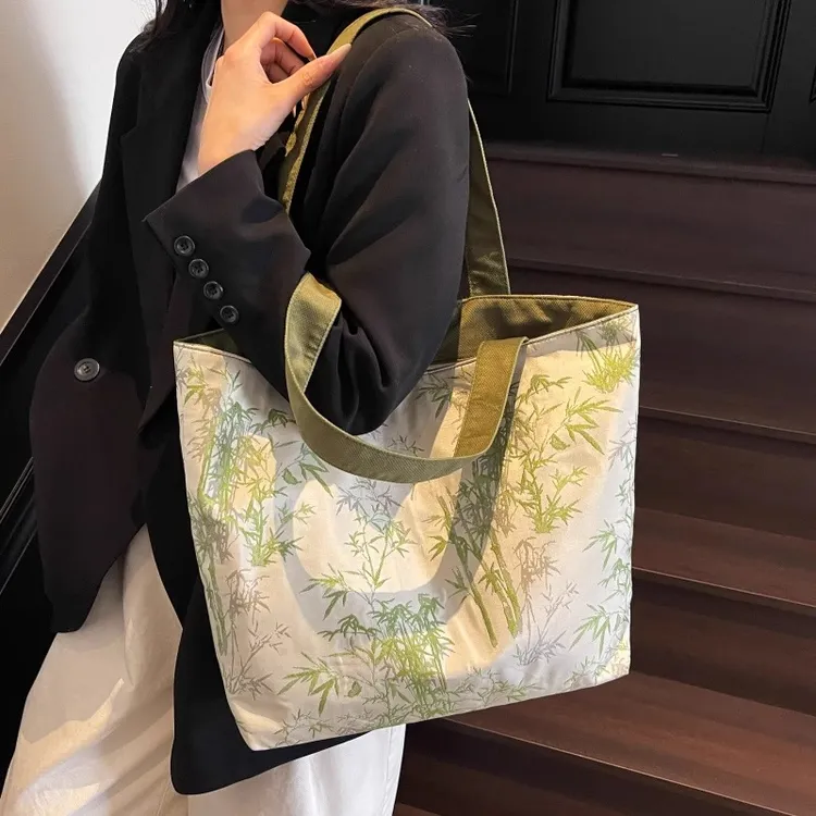 轻便百搭尼龙布包包女2025新款休闲大容量单肩包大学生通勤托特包