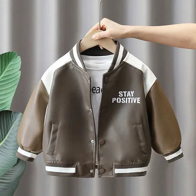 春装行政夹克儿童2025新款装男孩机车皮衣宝宝款潮流拼色外套时尚