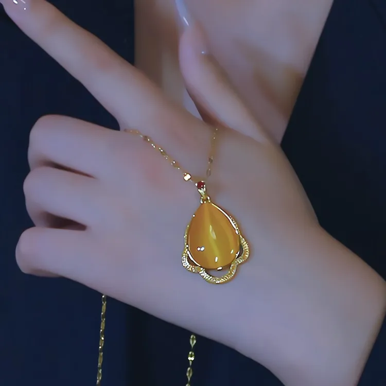 钛钢项链 复古轻奢黄色水滴项链气质时尚海洋之心吊坠百搭毛衣链