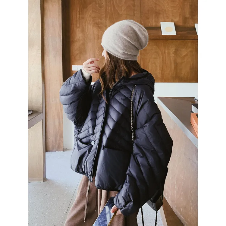 韩版轻暖排骨款羽绒服女冬2025新款洋气廓形连帽轻薄白鸭绒面包服