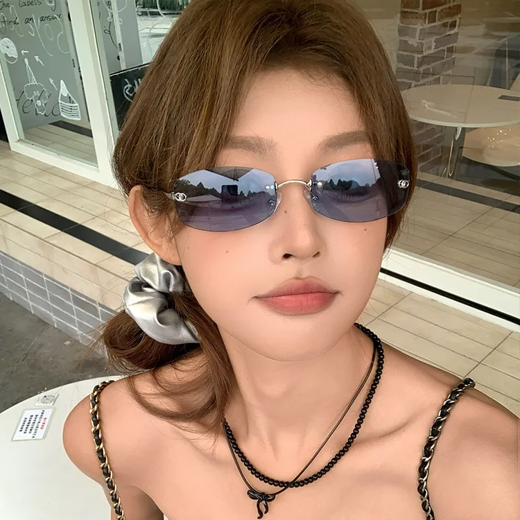 槑槑哒高级感无框墨镜女蓝色素颜百搭防晒太阳眼镜新款街拍凹造型